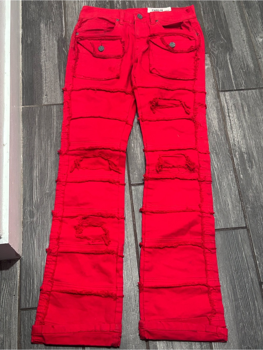 Bold Red Flare Jeans with Panel Distressing